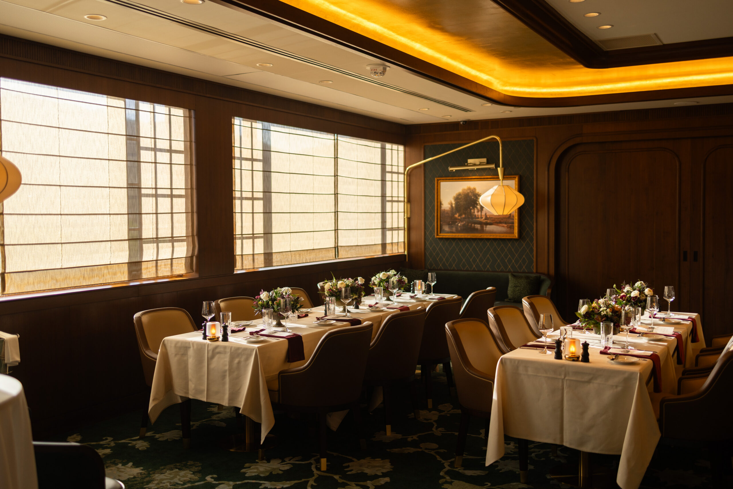 Elegant private dining room set for a corporate dinner