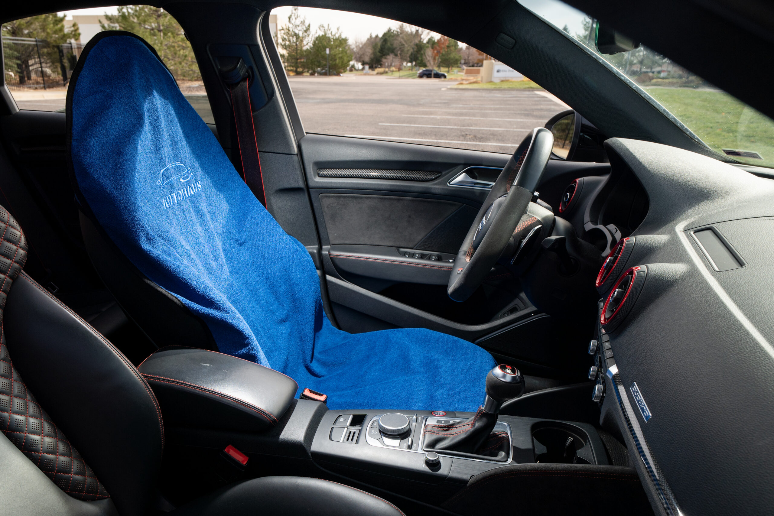 Automotive product photography of a custom blue car seat cover