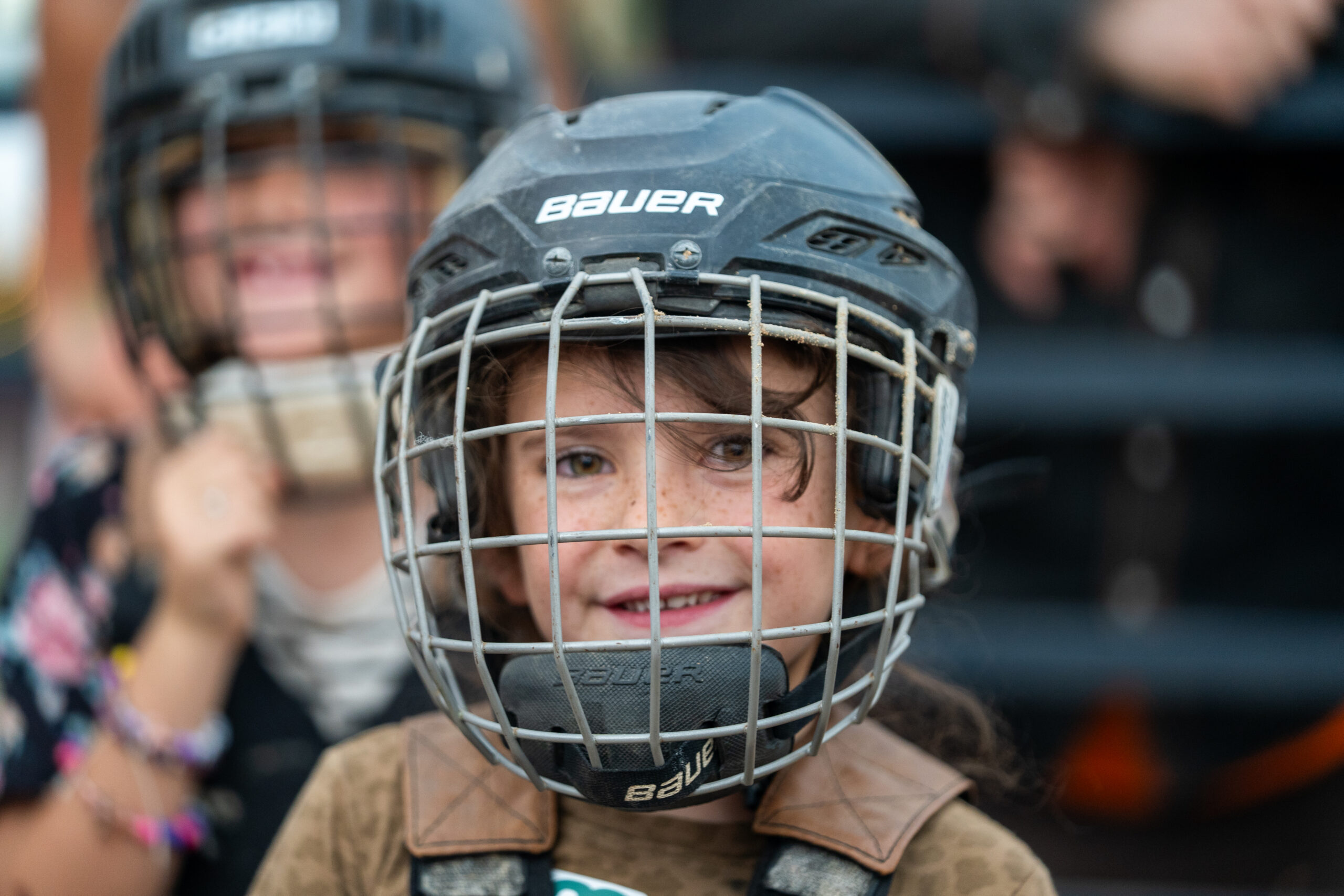 Young mutton-busting participant waiting in protective gear