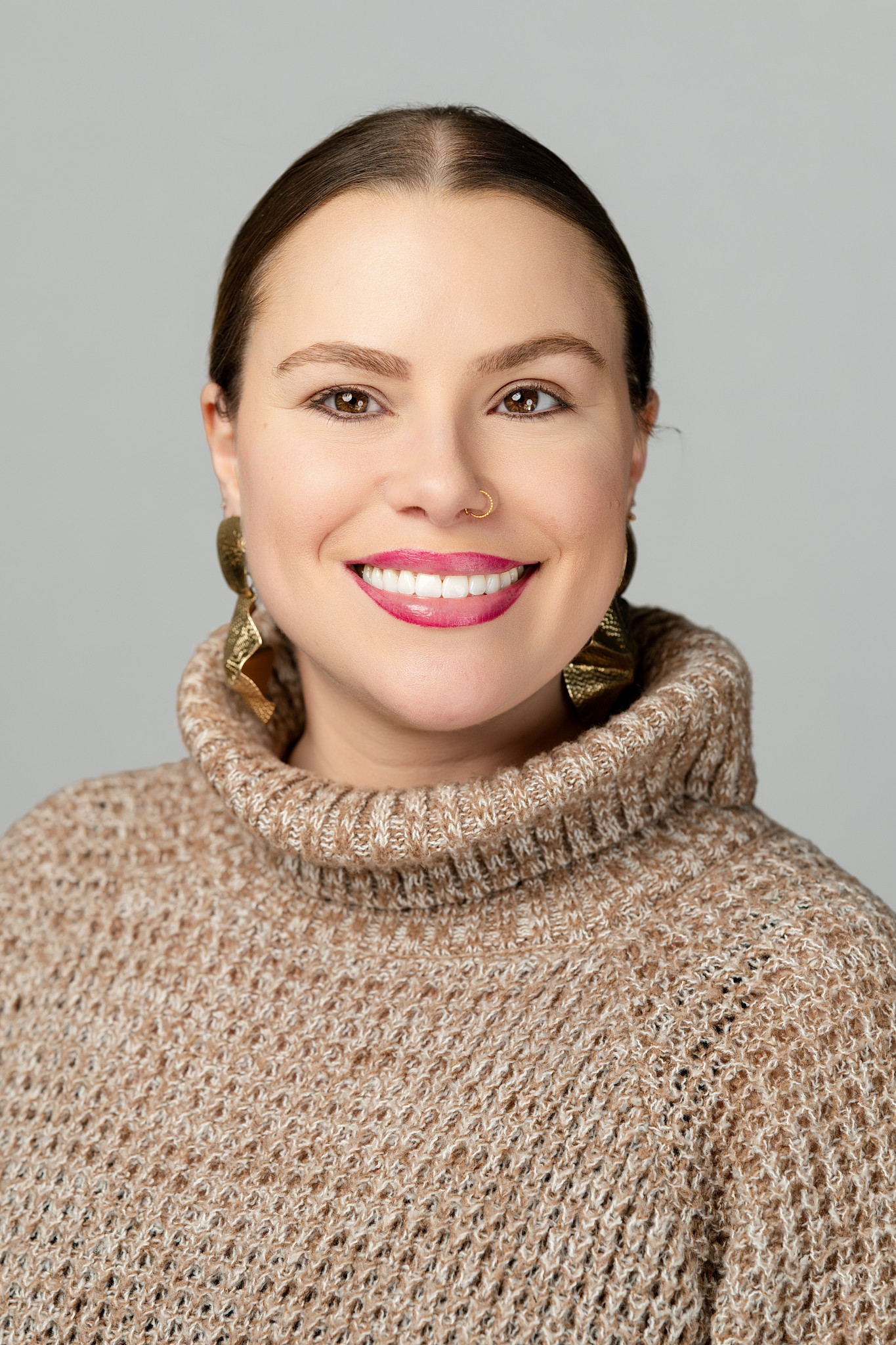 Professional corporate headshot of a business leader