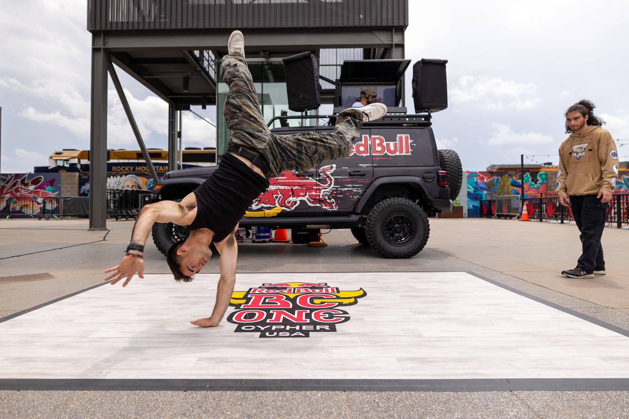 Breakdancer performing at a branded outdoor event