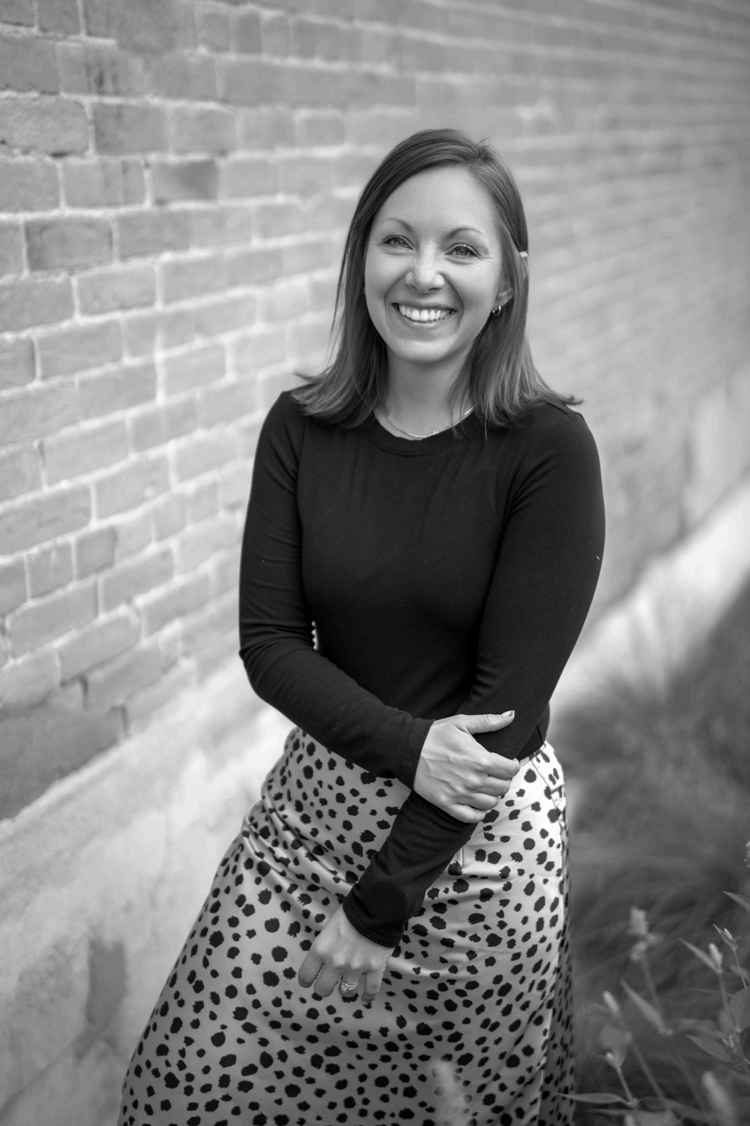 Brittany Scheer, head of wedding sales and photographer at Emberlight Media