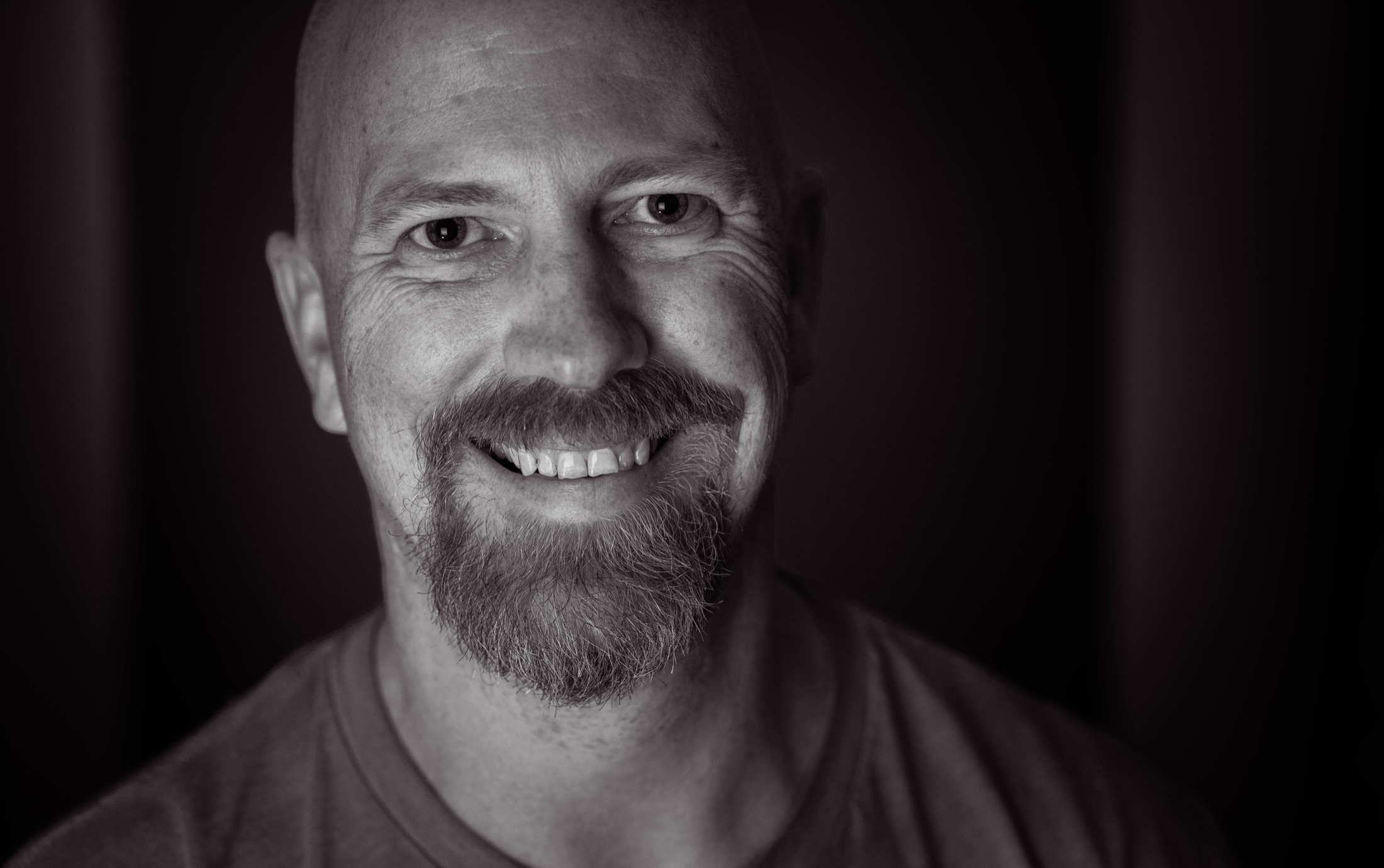 Charlie, principal photographer and headshot specialist at Emberlight Media