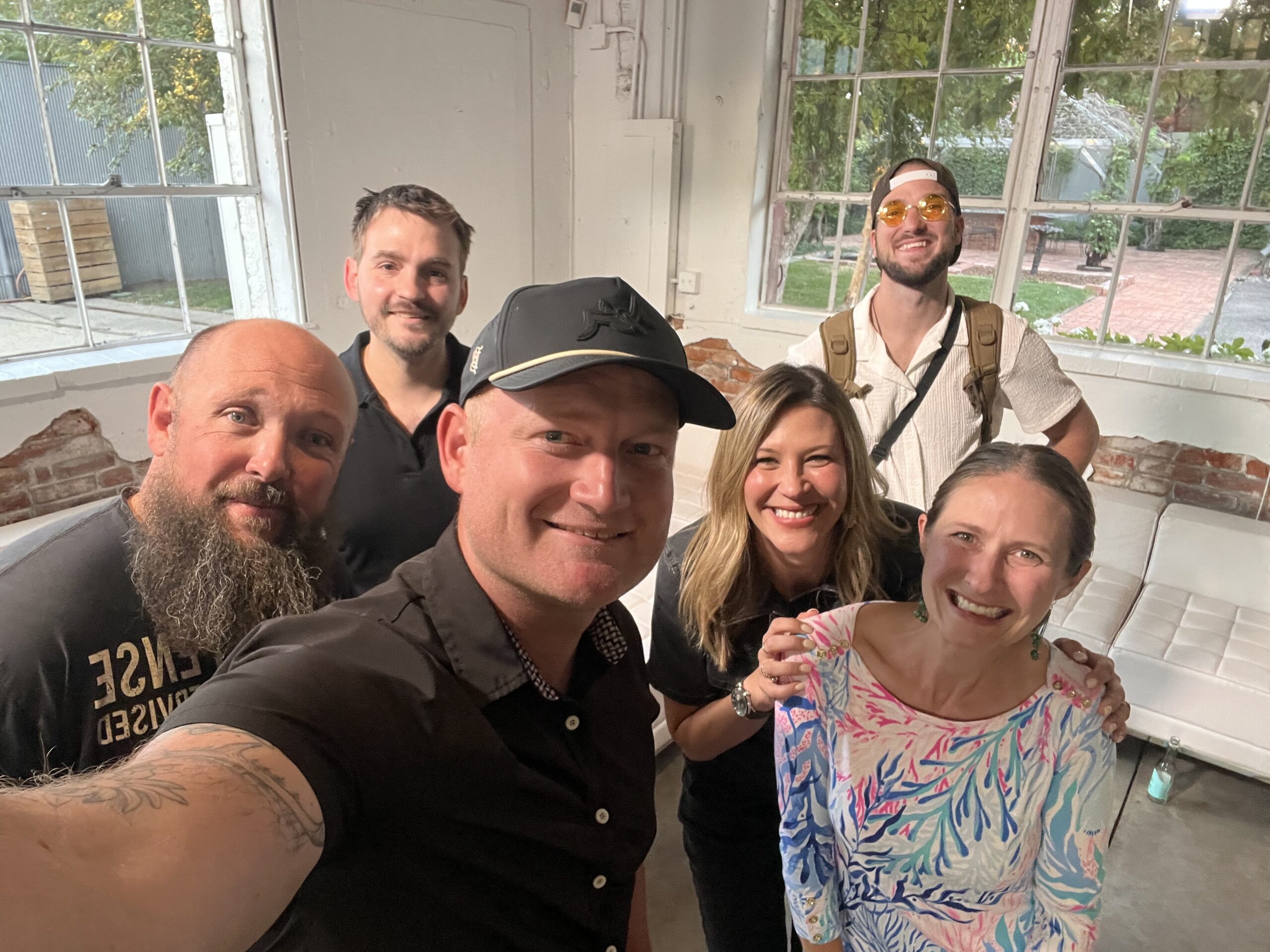 Emberlight Media teammates smiling together between assignments