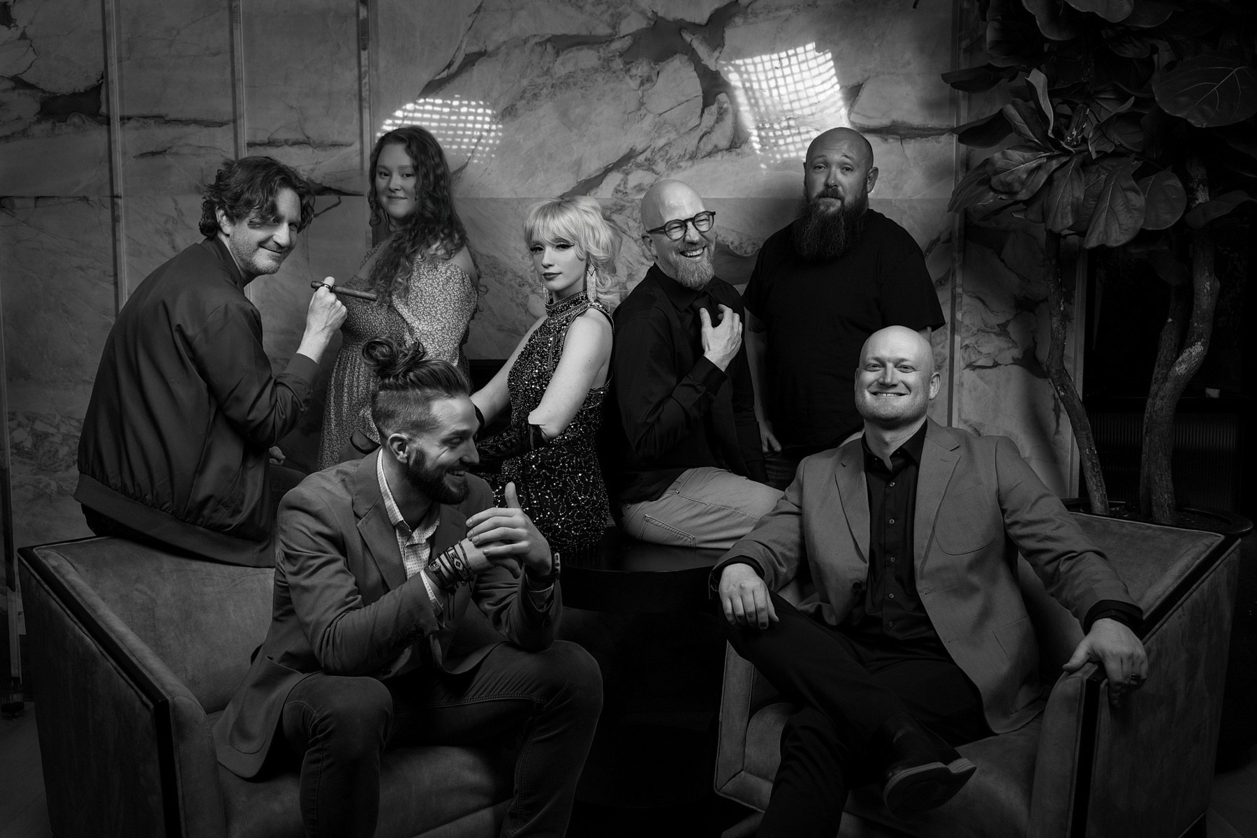 Emberlight Media creatives sharing a relaxed group portrait between assignments
