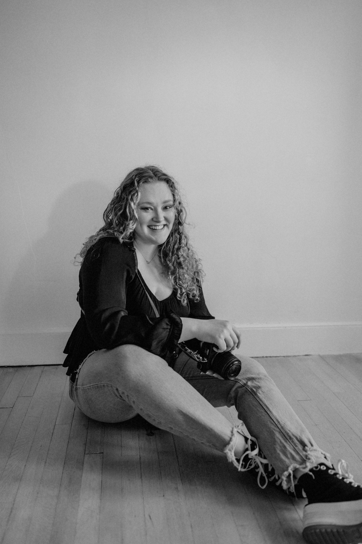 Katie, principal photographer and production coordinator at Emberlight Media